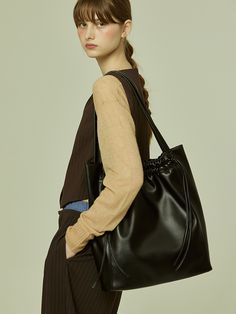 Editor's NoteOTHER TEMPO's practical designed bags can be matched with various trendy and casual outfits.- Soft vegan leather creates a natural fit- Big size that can store 16 in. laptop- Magnetic closing detail- Wrinkle design on the entranceMeasurements(in.)- Size: 13.39 in. * 15.35 in. * 3.94 in.- Strap: 24.41 in.Composition & Care- Vegan Leather / Twill- Avoid direct heat and moisture- The leather may have fine scratches and wrinkles- Professional cleaning is neededDesigner- by OTHER TEM Trendy Black Leather Laptop Bag, Trendy Black Laptop Bag, Trendy Leather Laptop Bag With Removable Pouch, Casual Black Leather Laptop Bag, Casual Leather Laptop Bag With Large Capacity, Casual Large Capacity Leather Laptop Bag, Casual Soft Leather Bags For Work, Casual Daily Use Laptop Bag, Casual Soft Leather Workwear Bags