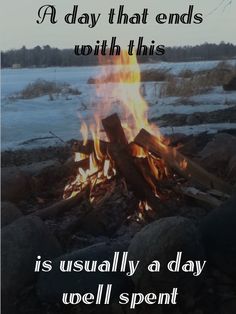 a campfire with the caption'a day that ends with this is usually a day well spent '