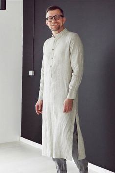 This elegant and comfy linen shirt makes a luxurious and functional gift for that special man in your life. Add this item to your Black Friday shopping list. Get Christmas gifts in advance. #longlineshirt #menstunic #mensyogaclothes #linenkaftan #dressshirt #ecofriendlybrand #ethicalclothes #ethicalfashion #men'stunic #sustainablefashion #christmasgiftforhim #christmasgift #blackfriday Shirt Kaftan, Black Friday Shopping List, New Clothing Trends, Long Linen Shirt, Mens Tunic, Mens Yoga Clothes, Stylish Shirts Men, Linen Tunic Dress, Beige Shirt