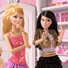 two barbie dolls standing next to each other in a pink and white room with gold accessories