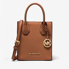 Questions? Leave A Comment Below! Michael Kors Mobile Phone Crossbody Bag, Michael Kors Crossbody Mobile Phone Bag, Michael Kors Rectangular Textured Leather Bag, Michael Kors Textured Leather Shoulder Bag, Michael Kors Rectangular Leather Bag, Michael Kors Leather Bag For On-the-go, Chic Michael Kors Shoulder Bag With Phone Pocket, Michael Kors Leather Shoulder Bag With Phone Holder, Tan Textured Leather Crossbody Bag