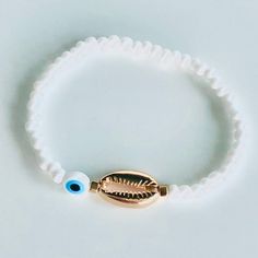 One Evil Eye Shell Bracelet (White Color) Shell Bracelet, Womens Jewelry Bracelets, Evil Eye, White Color, Shells, Color White, Women Jewelry, Bracelet, White