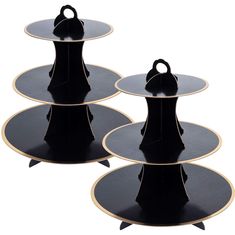 three tiered black and gold serving trays