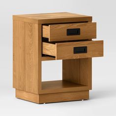 a wooden table with two drawers on one side and an open drawer on the other