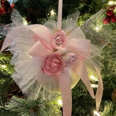 a close up of a christmas ornament on a tree