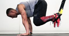 a man doing a handstand on one leg with his feet in the air