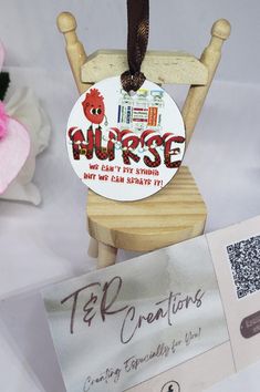 a wooden chair with a sign on it