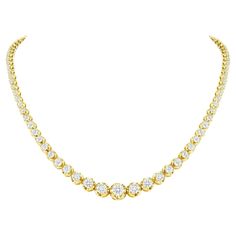 This finely made graduated necklace with beautiful round diamonds sits elegantly on any neck. Metal: 14k Gold Diamond Cut: Round Total Diamond Approx. Carats: 5ct Diamond Clarity: VS Diamond Color: F-G Size: 18 inches Color: Yellow Gold Included with your order: Certificate of Appraisal Customized Necklace Box & Bag Luxury Yellow Diamond Necklace Gift, Luxury Yellow Diamond Necklace For Formal Occasions, Luxury Diamond Cut Station Necklace In Yellow Gold, Luxury Yellow Gold Tennis Necklace For Engagement, Luxury Yellow Gold Single Strand Tennis Necklace, Luxury Yellow Gold Diamond Necklace For Party, Luxury Gold Plated Diamond Necklace Tarnish Resistant, Luxury Yellow Gold Diamond Necklace With 17 Jewels, Customized Necklace