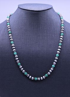 "This Southwestern inspired necklace is made from high quality sterling silver Native American Navajo Pearls and AAA grade natural malachite beads. This stunning necklace is made with dreamy light green malachite beads that give a bright pop of color, and at the same time add a subtle softness which compliments the Navajo beads making it easy on the eye. This beautiful necklace is a show stopper, and is guaranteed to deliver many compliments! The stones are beautiful shades of soft light green w Silver Turquoise Necklace With Round Beads In Southwestern Style, Silver Single Strand Southwestern Turquoise Necklace, Silver Single Strand Turquoise Southwestern Necklace, Southwestern Silver Jewelry With Spacer Beads, Southwestern Silver Single Strand Turquoise Necklace, Silver Southwestern Turquoise Single Strand Necklace, Southwestern Silver Turquoise Necklace With Gemstone Beads, Southwestern Single Strand Sterling Silver Jewelry, Southwestern Silver Necklace With Spacer Beads