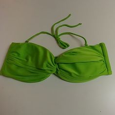 Top Melon Lime Green Bikini Top That Can Be Worn As A Halter Top Or Strapless. Never Worn But Without Tags. Approximate Measurements (See Sizely Picture): 1 - 5" 2 - 6.5" Green Halter Top With Built-in Bra For Beach Season, Strapless Green Tankini For Swimming, Strapless Green Swimwear For Pool, Green Bandeau Tankini With Stretch, Green Bandeau Stretch Tankini, Green Beachwear Tube Top For Pool, Green Bandeau Tube Top For Swimming, Green Summer Halter Top For Beach Party, Summer Green Halter Top For Beach Party