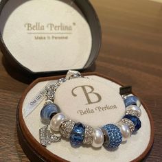 Bella Perlina Blue And Silver Charm Bracelet With Sailboat Charm On Size Fits All New With Tags Retail Value: $125 Blue Charm Bracelet For Party, Luxury Blue Bracelet For Party, Blue Sterling Silver Bracelets For Party, Elegant Blue Sterling Silver Charm Bracelet, Elegant Blue Jewelry With Silver Beads, Elegant Light Blue Bracelets For Party, Elegant Light Blue Bracelet For Party, Pandora Bracelet Designs, Gold Bracelet Set