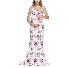 White With Bright Pink And Purple Floral Pattern Long Dress. Maternity Dress Featuring A Superbly Soft And Stretchy Rayon/Spandex Material Which Is Perfect For A Growing Belly And Soon To Be Nursing Mother. Has Ruffles Around Neckline With Spaghetti Strap. Fits Slim And Makes A Mermaid Silhouette. Fitted White Floral Print Gown, Summer Purple Maxi Length Gown, Sleeveless Purple Summer Gown, Pink Floral Print Maxi Dress For Maternity, White V-neck Maternity Maxi Dress, White V-neck Maxi Dress For Maternity, White Floral Print Party Gown, White Floor-length Gown With Floral Print, White Floral Print Floor-length Gown