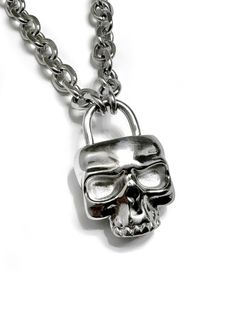 Solid stainless steel Waterproof No tarnish. No rust. No green skin. Chain length is 18” - adjustable This is not your average padlock. Shaped like a skull with a key hole as the nose. It's a visual metaphor for unlocking the mind behind the skull. Let this pendant be a reminder to escape your negative thoughts and embrace a more positive mindset. Free your mind! *As with any pendant design, the meaning can be subjective and may differ based on personal experiences and beliefs. Visual Metaphor, Green Skin, Free Your Mind, A Skull, Skull Necklace, The Skull, Key Hole, Pendant Design, Negative Thoughts