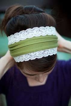 a woman wearing a green headband with white lace