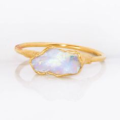 ✨ Free U.S. Shipping and Free U.S. 90 Day Returns ✨ Sustainably Handmade in the USA F E A T U R E S * Raw Australian Opal - 7-11mm * Conflict Free Gemstone * October Birthstone * All ring shanks are made with recycled materials * Ring Shank Material - 1mm - Your choice of 24k Gold Dipped 14k Yellow Gold Fill, 24k Rose Gold Dipped 14k Rose Gold Fill, or 925 Sterling Silver * Each piece is One-of-a-kind with unique gemstones R I N G C R U S H ◦ H I G H L I G H T S * Made in Atlanta, GA * Made by a Raw Opal Ring, Gemstone Stacking Ring, Rose Gold Opal Ring, Lotus Ring, Blue Opal Ring, Raw Crystal Ring, Raw Gemstone Jewelry, Raw Gemstone Ring, Opal Engagement Ring