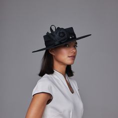 Woman with dark hair wearing a white dress and a black straw boater with a camellia and a bow Fitted Black Boater Hat For Races, Elegant Black Straw Hat, Classic Black Boater Hat In Toquilla Straw, Classic Black Brimmed Boater Hat, Summer Headwear, Rachel Trevor Morgan Millinery, Rachel Trevor Morgan, Straw Boater, Hats Black