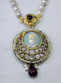 "Vintage antique 22 K solid gold and Ruby pearl Sapphire gemstone Necklace. Original old Royal piece with Maharaja (king)miniature painting inserted in very good condition. Size of pendant-3.5 cm, Length -35 cm(13.77\") end to end, free size easy to adjust the length by moving cord knot. weight-44 grams, material -22 K gold, Ruby, pearls, Sapphire." 22k Gold Temple Jewelry Pearl Necklace As Gift, Traditional Round Necklace With Pearl Pendant, Antique Gold Meenakari Necklace, Traditional 22k Gold Kundan Necklace As Gift, Antique Hallmarked Temple Necklace For Festivals, Antique Chandbali Temple Necklace As Gift, Antique Chandbali Temple Necklace For Gift, Traditional Gold Pearl Necklace With Gemstone, Gold Pearl Necklace With Gemstone In Traditional Style