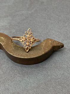 Lace ring. 14k Yellow gold Floral ring. Leaves gold ring. Filigree ring. dainty gold ring. gold ring. gift for her. gold jewelry. ▶▶This is a great ring to wear by itself, it sure stands out by it's own.. or it can be combined with your every day or festive jewelry for a smart individualist style. It fits both styles, casual and fancy for any occasion◀◀ ♥ About The Ring: The ring is made of solid 14K yellow\ white \rose gold. ♥ Shipping Info: All rings are packaged and shipped in a beautiful rin Elegant Rose Gold Stackable Rings For Gift, Dainty 14k Rose Gold Midi Rings, Elegant Rose Gold Midi Rings For Wedding, Heirloom Rose Gold 14k Rings, 14k Gold Filigree Ring Jewelry, Fine Jewelry 14k Rose Gold Midi Rings, Rose Gold Filigree Jewelry For Wedding, Dainty 14k Rose Gold Rings, 14k Rose Gold Stackable Rings Fine Jewelry