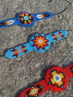 Bead work is an art form expressed and practiced throughout Native American Tribes. Each tribe has designs, colors, patterns and techniques that they are identified by. Here we have a few Original one of a kind handmade colorful beaded bracelets. Length aprx: 6 inches(bead work) total length 15 inches. width aprx : 1.5 inches Average weight aprx: 14.4 grams If you need more pictures or have any questions feel free to contact me, I will get back to you as soon as possible. *Customer service is ve Bohemian Beaded Wristband For Festivals, Southwestern Style Large Beads Bracelet For Festivals, Bohemian Round Beaded Wristband For Festivals, Artisan Friendship Bracelets With Colorful Beads For Festivals, Traditional Braided Bracelets With Round Beads For Festivals, Traditional Festival Braided Bracelets With Round Beads, Handmade Blue Beaded Bracelets For Festivals, Unique Hand-strung Friendship Bracelets For Festivals, Multicolor Hand-strung Wristband For Festivals