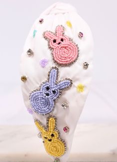 This festive headband features beaded bunnies outlined in CZs with colorful accents as well. It is such a fun accessory to celebrate the Easter season! Perfect for egg hunts! Festival Headband, Headband White, Easter Season, White Headband, Egg Hunt, Accent Colors, Egg, Easter, Festival