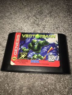 the gameboy for the video game vetterman is sitting on top of the carpet