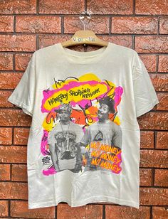 Vintage 90s In Living Color 1990 American Comedy Sitcom Hip Hop T Shirt / Raptee / Pop Culture / Vintage Movie T Shirt Size M Condition : Good Used  Size on tag : M Colour : White Brand : Unknown Measurement : Armpit to armpit - 19" Length - 25" Material : Old Cotton Made In: Usa THE SHIPPING (Your Choice Please read) 1. The shipping cost is USD 20 via Malaysian Registered Postage With Tracking Number. It will take 2-4 weeks or more for delivery, depends on your custom checking. 2. Add USD 10 fo Cheap Pop Culture T-shirt With Character Print, Hip Hop T Shirt, American Comedy, In Living Color, Live Colorfully, Vintage Film, Vintage Movie, Movie T Shirts, White Brand