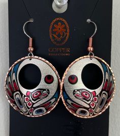 On offer is a West Coast First Nations Copper silver-plated and diamond-cut designs copper earrings. Surgical Steel ear wires. New in box and no polishing needed. Fine example of Indigenous Art from the Northwest Coast First Nations of Canada. If you want to see more of my items, google ( The Kanata Shop ) NOTE: APPLIES TO ALL BUYERS  Look At all Picture's Closely, What You See Is What You Will Receive, I Do My Best To Get You The Best View Of The Item.  (PLEASE ASK ALL AND ANY QUESTIONS?)  LOOK West Coast Jewelry, Multicolor Round Copper Jewelry, Artisan Rose Gold Metal Jewelry, Artistic Metal Drop Earrings, Metal Dangle Earrings With Artistic Design, Artistic Design Metal Dangle Earrings, Handmade Rose Gold Collectible Jewelry, Metal Earrings With Artistic Design For Gifts, Multicolor Copper Jewelry Gift