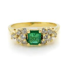 Sweet and rather petite, a rich green emerald-cut green emerald weighing 0.60ct is surrounded and flanked by 12 bright and sparkling round brilliant-cut diamonds weighing 0.36ct. This delightful estate jewel is presented in rich and sturdy 14K yellow gold. Ring size 5.25. Total weight: 2.91 grams. Comes with a presentable gift box. Rachel Koen Green Emerald 0.60ctw Diamond 0.36ctw Ring 14K Yellow Gold Size 5.25 Description Sweet and rather petite, a rich green emerald-cut green emerald weighing Round Diamonds Wedding Band, Star Of David Pendant, Emerald Diamond Ring, Diamond Promise Rings, Rich Green, Pearl Diamond, Yellow Gold Ring, Green Emerald, Diamond Pendant Necklace