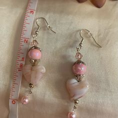 Gorgeous Glass Heart & Pearl Earrings. Gorgeous Shades Of Pink. Never Worn-Brand New! ~ Check Out My Other Listings! Smoke Free Home ~ Fast Shipping Ask Questions Prior To Purchase Or Bidding As All Sales Are Final. + Bundle & Save! Thanks For Shopping With Me! Elegant Adjustable Heart Dangle Earrings, Elegant Adjustable Heart Earrings, Elegant Adjustable Heart Beads Earrings, Heart Pearl Earrings, Heart Dangle Earrings, Gorgeous Glass, Glass Heart, Shades Of Pink, Wire Earrings