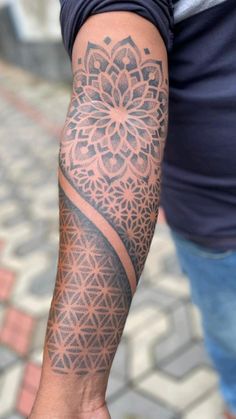 a person with a tattoo on their arm