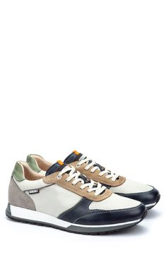 Mixed colors and textures lend visual intrigue to a sporty leather sneaker crafted for comfort. Lace-up style Removable insole Leather upper/leather and textile lining/synthetic sole Imported Leather Casual Sneakers For Jogging, Casual Leather Sneakers For Jogging, Blue Leather Walking Shoes With Ortholite Insole, Blue Low-top Leather Walking Shoes, Blue Leather Low-top Walking Shoes, Leather Walking Shoes For Jogging, Leather Sneakers With Round Toe For Jogging, Sporty Leather Custom Sneakers For Jogging, Sporty Custom Leather Sneakers For Jogging