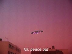 a pink sky with the words jol, peace out in front of an alien like object