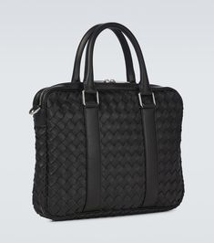 Find BOTTEGA VENETA Classic Medium Intrecciato Leather Briefcase on Editorialist. Made in Italy. Comes with dust bag. Color of fastening: silver. Internal details: leather lining, internal zipped pouch. Closure: zipped top. Detachable, adjustable shoulder strap, Top handles. Material: calf leather. Luxury Leather Bag With Woven Detail, Luxury Woven Leather Bag, Designer Leather Briefcase For Evening, Designer Leather Briefcase With Leather Handles, Designer Black Briefcase For Daily Use, Black Luxury Briefcase With Leather Lining, Luxury Black Briefcase With Leather Backing, Luxury Black Briefcase With Leather Lining, Designer Black Briefcase