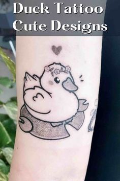 a tattoo with a duck on it and the words duck tattoo cute designs above it