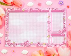 a pink planner with flowers and clouds around it on a pink background, next to tulips