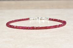 "Natural Ruby Bracelet, July Birthstone Bracelet, Beaded Gemstone Jewelry, Dainty Stacking Bracelet, Wife, Friend, Mothers Day Gift for Her -Please Note: My pictures are magnified to show detail. -Ruby is the birthstone for July. -The Ruby beads are approximately 3-3.5mm. -The clasp and findings are sterling silver, gold-filled, or rose gold filled. -Your purchase will be sent in a gift box. -A portion of this purchase will be donated to a Pug rescue or a Pug in need. -How to determine your brac Ruby Beaded Bracelets With Round Beads As Gift, Ruby Beaded Bracelets As A Gift, Ruby Beaded Bracelets With Gemstone Beads As Gift, Ruby Beaded Bracelets With Round Beads For Gift, Gift Ruby Gemstone Beaded Bracelets, Mini Bracelet, Bead Sizes, Ruby Birthstone, Ruby Bracelet