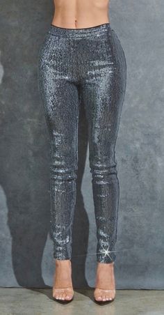 Beautiful charcoal silver sequin skinny leg pants with back zipper. Lined with black mesh fabric.  Make a bold statement at your next event in these sparkly pants.  Lighting may affect the color in the photos.  Crop top not included  Model is wearing a size Small * Sizing - All items are made according to measurement ranges, they are NOT typical letter or numeric sizing. It is imperative to compare your exact measurements with the size chart provided either in the listing photos or item descript Fitted Contrast Sequin Bottoms For Night Out, Fitted Bottoms With Contrast Sequin For Night Out, Fitted Contrast Sequin Bottoms For Party, Fitted Sequin Bottoms For Party, Contrast Sequin Pants For Night Out In Fall, Fall Contrast Sequin Pants For Night Out, Fall Night Out Pants With Contrast Sequin, Shiny Bottoms For Night Out In Fall, Shiny Bottoms For Fall Night Out