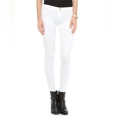 A Modern Day Classic, These Super Skinny Stretch White Jeans Are The Ultimate Summer Staple That Flatter Every Figure's Derriere. Featuring Gold Button And Rivet Details With Faux Front Pockets And Back Patch Pockets. Inseam- 30", Front Rise- 7.5", Leg Opening- 9.5". Fabric: Denim. 42% Lyocell, 33% Cotton, 15% Rayon, 1% Spandex. Machine Wash Cold. Imported. Label: Blank Nyc. Chic White Slim Fit Bottoms, High Rise Slim Fit White Pants, White High Rise Slim Fit Pants, White High-rise Slim Fit Pants, White Stretch Elegant Jeans, Elegant Stretch White Jeans, Elegant White Stretch Jeans, Chic Fitted White Jeans, Chic White Fitted Jeans