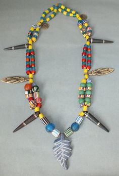 This necklace with glass beads and different amulet pendants originates from Nepal. The hanging length of the strand is 30 cm. The diameter of the beads is 0.7 cm to 1.5 cm. The pendants are 2 cm to 5.5 cm long. Its weight is 145 gram. (e7) SHIPPING SHIPMENT is FREE. All items are shipped within two working days after receipt of payment. We send everything by registered airmail. Insured packets (over 50 cm length / over 1500 gram) I send by standard way. PAYMENT Paypal is preferred. RETURN POLIC Multicolor Amulet Beaded Necklace For Festivals, Adjustable Multicolor Amulet Beaded Necklaces, Multicolor Beaded Amulet Necklace For Festivals, Colorful Beads Amulet Pendant Necklace, Multicolor Beaded Amulet Necklace, Jade Amulet, Crazy Jewelry, Tassel Shoes, Weird Jewelry