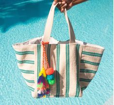 The GOA BEACH BAG promises to fit all your beach necessities with its large size. Made from hand-woven 100% cotton by women artisans in India, this bag is perfect for your next vacation or everyday hustle. Its striped design adds a touch of style to your beach look. Dimensions- 56 X 38 X 28 cm questions? shop@katiediamondjewelry.com Goa Beach, Beach Necessities, Clean Sterling Silver, Demi Fine Jewelry, Vermeil Jewelry, Gold Piece, Beach Bags, Beach Look, Women Artisans