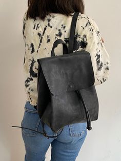 "This drawstring backpack is made of high quality vegan leather in black. It is very soft and lightweight but durable. It has a rustic, distressed look. t is water resistant. It can be used as diaper bag. It has one interior and one exterior zipper pocket. Straps are adjustable. It is suitable for both men and women. There is two size option: Small : 17 x 27 x 30 cm Large : 20 x 30 x 36 cm IMPORTANT! // Please add your phone number to the notes section before checkout. //  Delivery takes 2-5 day Black Casual Leather Backpack For Everyday, Casual Black Leather Backpack For Everyday, Black Leather Softback Backpack For Everyday, Black Softback Leather Backpack For Everyday, Black Leather Softback Backpack, Black Softback Leather Backpack, Vegan Leather Backpack, Black Leather Backpack, Visa Card