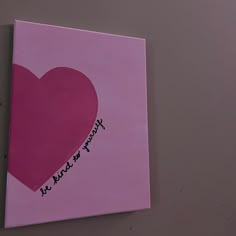 a pink card with a heart on it