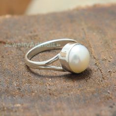 Pearl Ring, Natural Gemstone Ring, Handmade Band Ring, 925 Sterling Silver Ring, Gift For Her, Love Ring, Birthstone Ring, Anniversary Ring About Product:- Gross weight: 3.50 grams according ring size Ring Height & Width: 7x7 mm approx. Band Thickness: 3mm Approx. Gemstone Used: Pearl Metal Used: Solid 925 Sterling Silver Stamp Mark: 925 Metal Color: Shiny Silver Listing is For One (1) Piece Ring. These items are handmade. Jewelry Related: 925 Silver Ring, Middle Finger Ring, Sterling Silver White Pearl Ring With Simple Design For Anniversary, Anniversary Sterling Silver Birthstone Ring Simple Design, Silver Birthstone Pearl Ring For Anniversary, Adjustable Sterling Silver Pearl Ring In Fine Jewelry Style, White Sterling Silver Pearl Ring, Classic Sterling Silver Pearl Ring With Gemstone, White Pearl Sterling Silver Ring, Classic Adjustable Rings With Stone Setting, White Sterling Silver Solitaire Ring