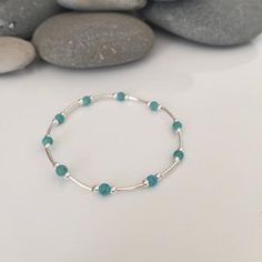 Chunky Turquoise Bracelet with Pave Diamond Bead Turquoise | Etsy Turquoise Bracelet With Silver Beads, Adjustable Turquoise Bracelet With Polished Beads, Turquoise Beaded Bracelets With Silver Beads, Turquoise Bracelet With Polished Beads As Gift, Turquoise Beaded Bracelets With Silver Beads For Gift, Turquoise Bracelets With Silver Beads For Gift, Turquoise Stretch Bracelet With Silver Beads, Adjustable Turquoise Stretch Bracelet With Silver Beads, Turquoise Beaded Bangle With Natural Stones