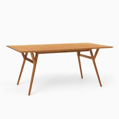 a wooden table with two crossed legs and a rectangular top, against a white background