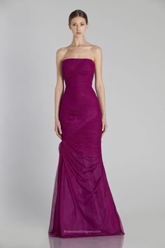 a woman in a long purple dress