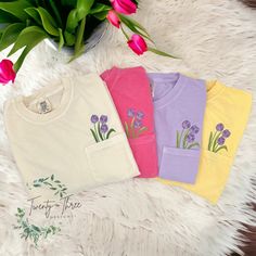 These embroidered floral pocket tees make the perfect Spring/Summer shirts! Check out our page for these shirts in more colors! if you don't see a color you want please message and we can discuss other options.  **shirt colors may vary slightly from shirt to shirt depending on dye. please use the color chart in the last picture for a truer color** ORDERING & SHIPPING *Your item will be shipped within 5-7 business days. *Please allow 2-5 business days to receive your item, more time may be necess Tulips Color, Embroidered Wildflowers, Embroidered Tulips, Tulip Colors, Pocket Tees, Spring Clothing, Color Crew, Floral Pocket, Spring Tulips