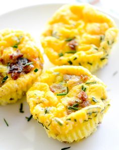 three mini frittatas on a white plate