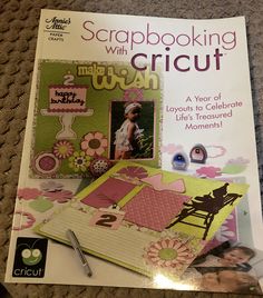 the cover of scrapbooking with cricut is laying on top of a table