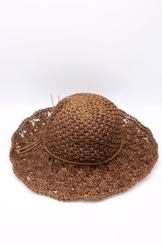 Our handmade hollow lace straw hats are beautiful and charming accessories. Our summer hats have an exquisite bow and have adjustable rope in inside of the hat fit all heads. They are chic and classic accessories for every women for protection of sun, summer parties, beach and holidays. They're also great gift. Color : Brown Size : 56-58 cm ( adjustable) Brim size : 11 cm Carry on easily with foldable structure You can brush with softly brush and wipe with a damp rag. All of our products are Fre Vacation Sun Hat With Crochet Trim, Vacation Hat With Crochet Trim And Wide Brim, Vintage Brown Sun Hat For Vacation, Vintage Brown Hats For Beach, Brown Crochet Beach Cap, Vintage Crochet Beach Cap, Brown Bohemian Paper Straw Hat, Bohemian Brown Paper Straw Hat, Brown Sun Hat Cap For Summer